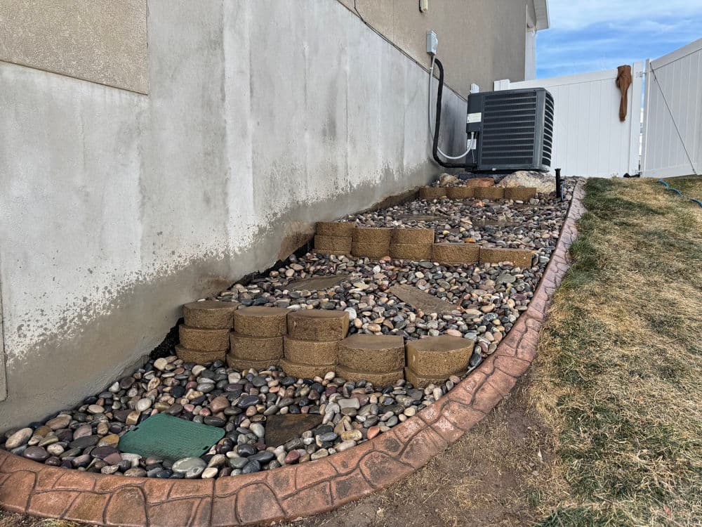 Gallery photos for Steep Grade Garden Bed Gets Retaining Wall Tiers and River Rock: Image #7