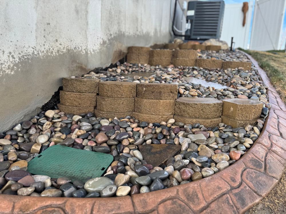 Gallery photos for Steep Grade Garden Bed Gets Retaining Wall Tiers and River Rock: Image #8