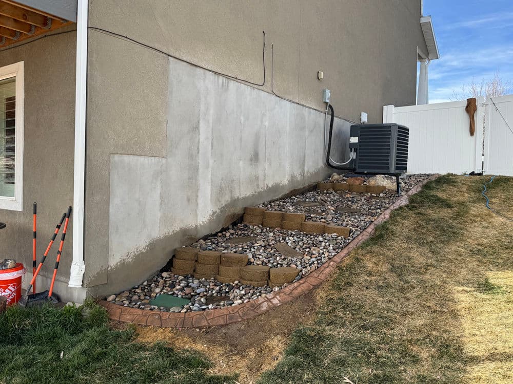 Gallery photos for Steep Grade Garden Bed Gets Retaining Wall Tiers and River Rock: Image #10