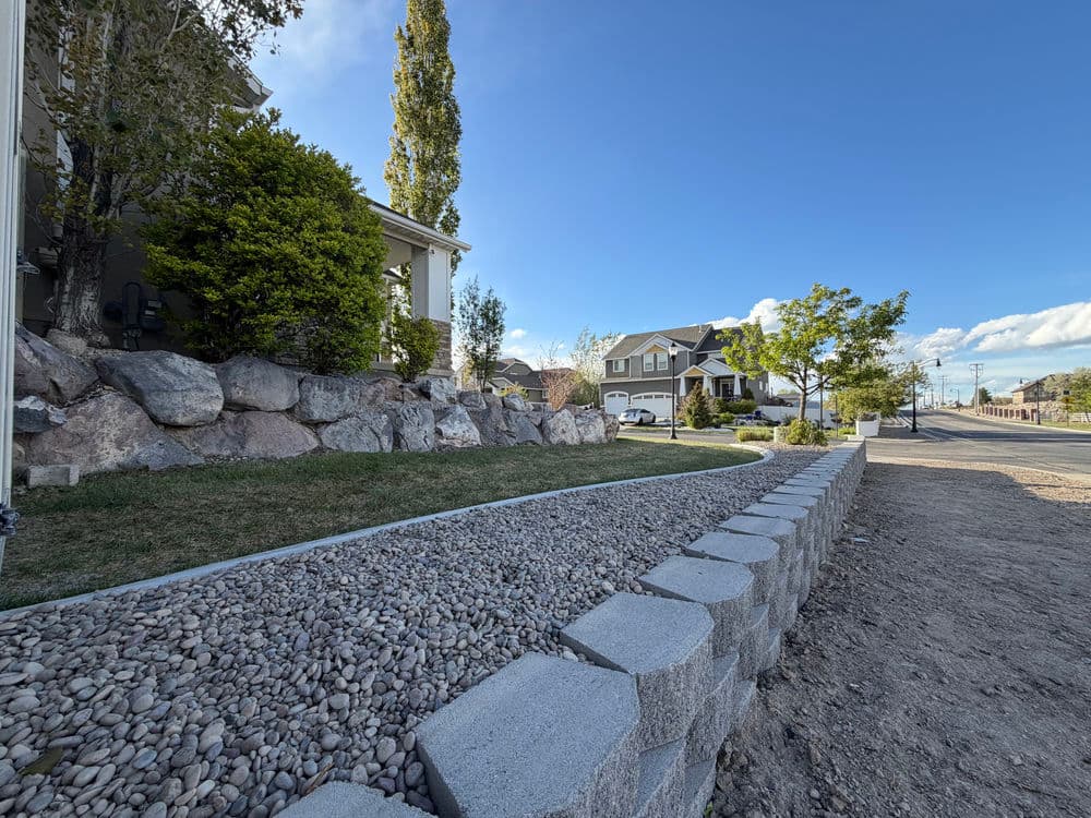 Gallery photos for River Rock Xeriscaping with Concrete Curbing and Retaining Wall in Herriman: Image #1