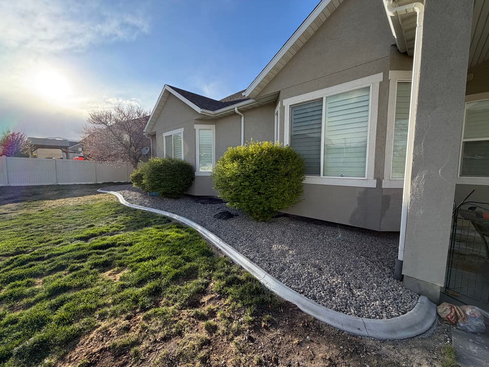 Gallery photos for River Rock Xeriscaping with Concrete Curbing and Retaining Wall in Herriman: Image #4