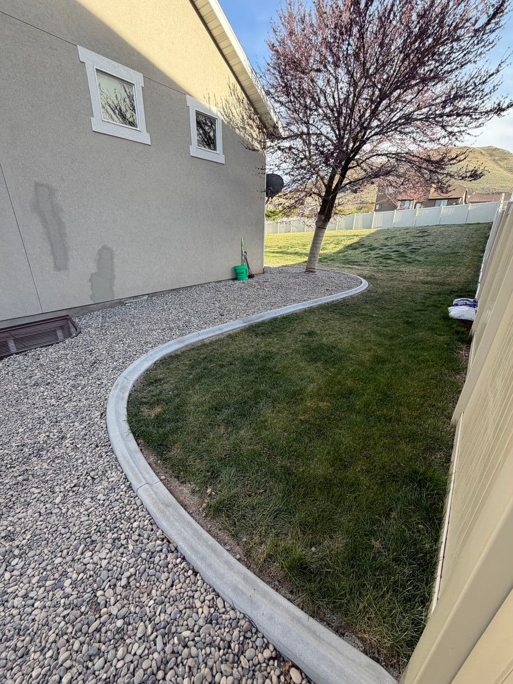 Gallery photos for River Rock Xeriscaping with Concrete Curbing and Retaining Wall in Herriman: Image #8