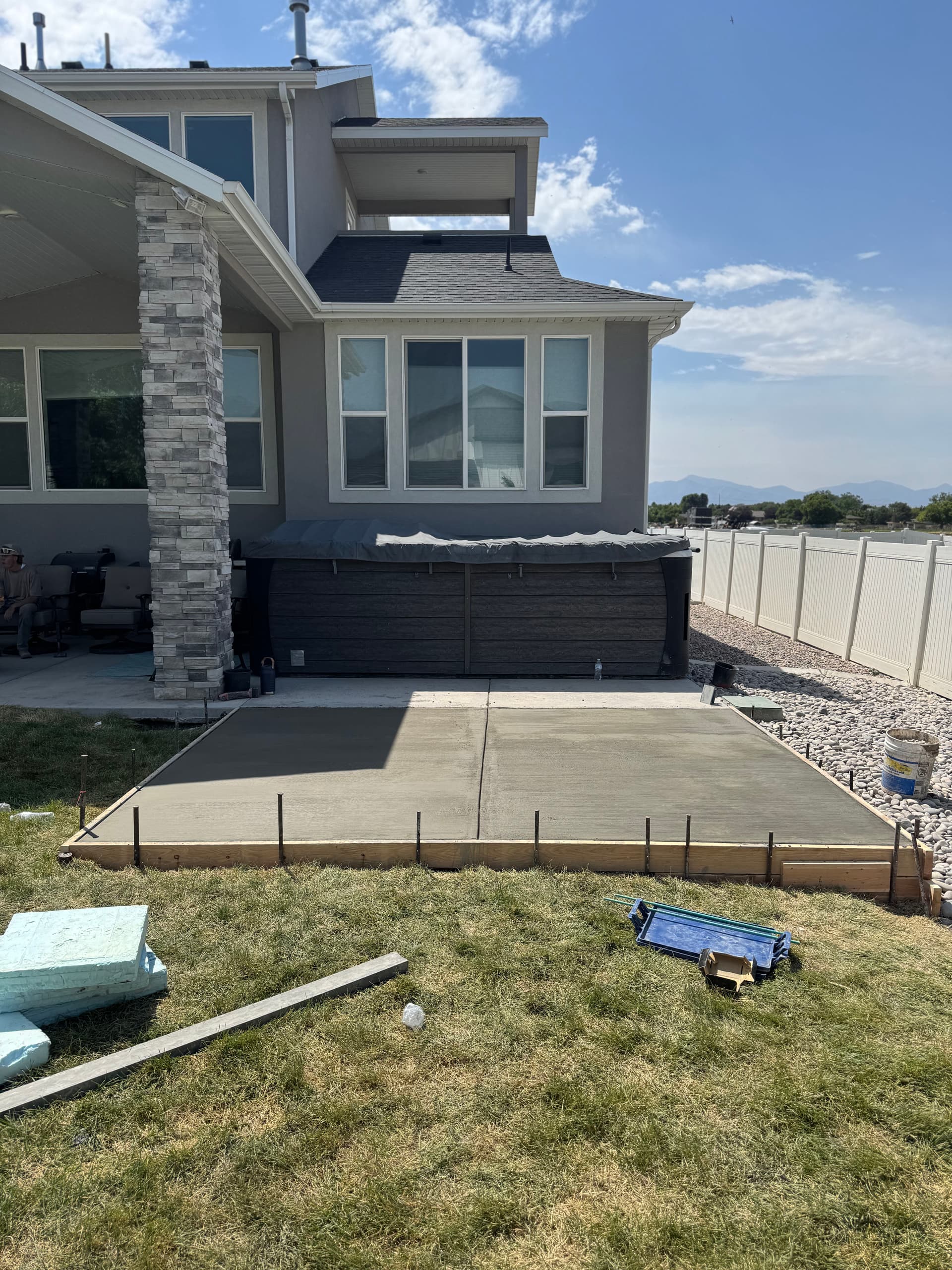 Gallery photos for Backyard Patio Expansion with River Rock and Garden Beds: Image #8
